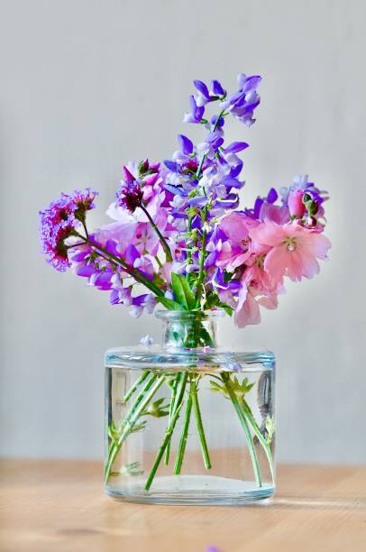 istock Cut flowers in glass 1263451594