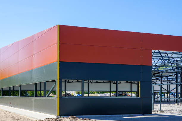 Metal frame of the new building with a sandwich panel of insulation on the wall Metal frame of the new modern building with a sandwich panel of insulation on the wall sandwich panel photos stock pictures, royalty-free photos & images