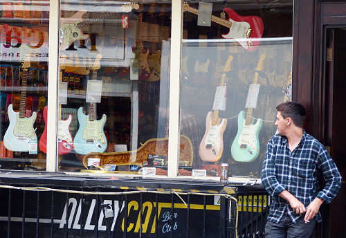 London / England, UK - July 2, 2014 - Denmark Street, London. Denmark Street in London is famous for its musical instruments shops.
