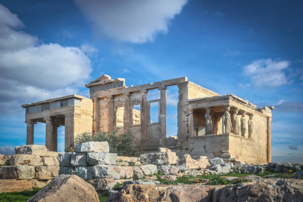 The famous Porch of the Caryatids or the Maidens on the south side of the Erechtheion or Erechtheum, an ancient Greek temple on the north side of the Acropolis of Athens in Greece, dedicated to Athena stock photo