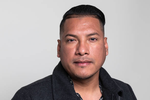istock Pensive Hispanic man looking at the camera 1263465473