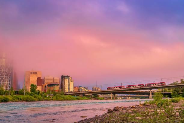 istock Summer Sunrise Over Calgary Cityscape And River 1263466976