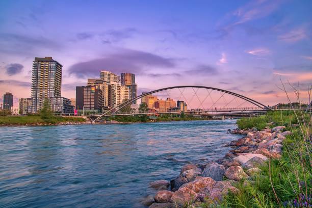istock Summer Sunrise Over Calgary Cityscape And River 1263467106
