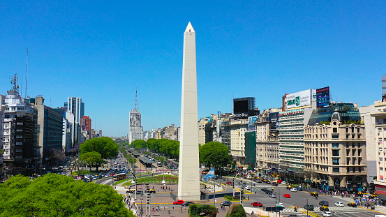 Buenos Aires, Argentina – March 30, 2023: The Obelisk, modern symbol of the city of Buenos Aires, at the intersection of 9th July Ave. and Corrientes Ave. Built in 1936. Copyspace