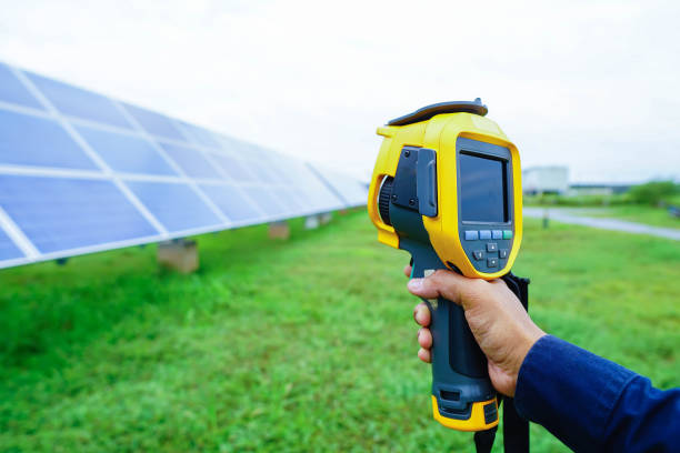 istock Thermoscan(thermal image camera), Scan to the equipment for a temperature check, and this concept used to check the temperature of the Solar panel 1263473281