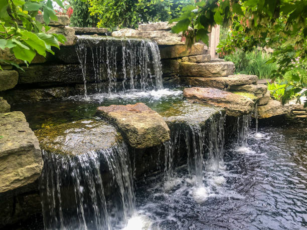 istock Two level waterfall at botanical garden 1263474134