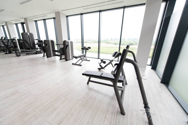 istock Large Modern Gym With Workout Equipment 1263476513