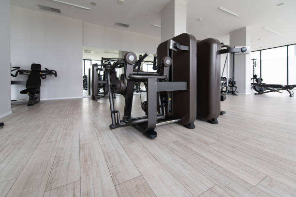 istock Large Modern Gym With Workout Equipment 1263476526