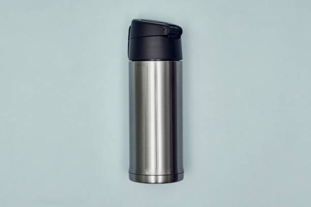 istock Metal thermos on a light background, top view. 1263477112