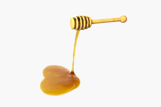 istock Golden honey drop from honey dipper, 3d rendering. 1263481417