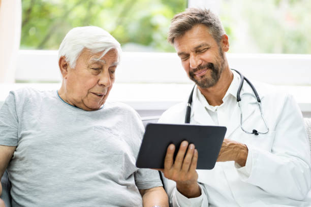 istock Home Care Elder Patient Looking At XRay Images 1263483945