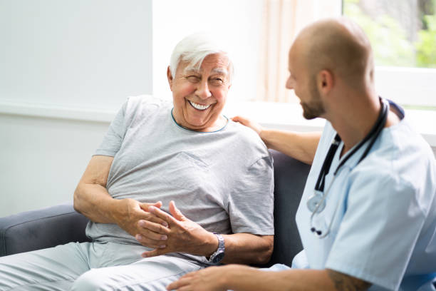 istock Old Senior Home Care Patient With Nurse 1263483956