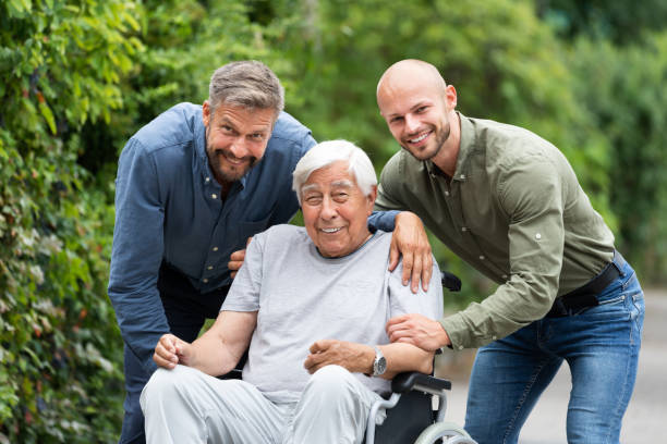 istock Old Disabled Grandfather In Wheelchair 1263483984