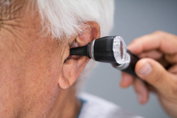 istock Otolaryngology Check. Doctor Checking Ear 1263484005