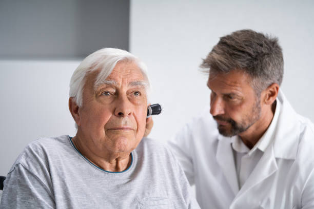 istock Otolaryngology Check. Doctor Checking Ear 1263484012