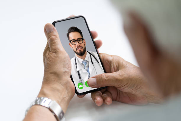 istock Senior Man In Videochat Or Videoconference With Doctor 1263484062