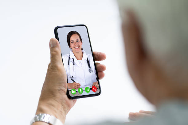 istock Senior Man In Videochat Or Videoconference With Doctor 1263484065