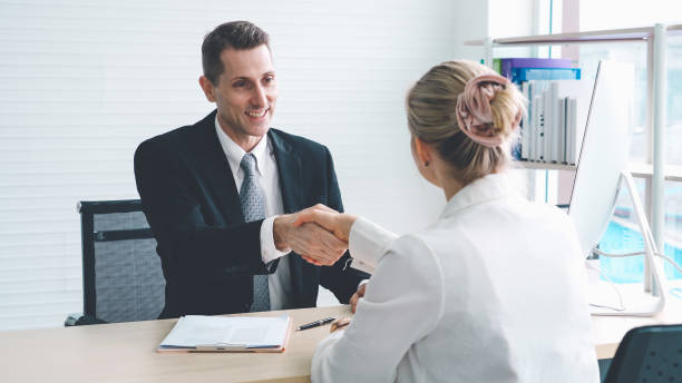 istock Job seeker and manager handshake in job interview 1263487341