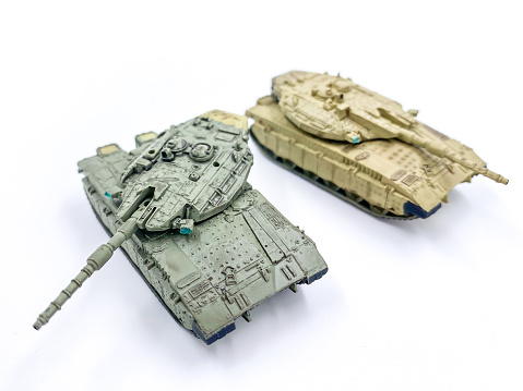 Hobby model toy tank scale 1/144 isolated on white background