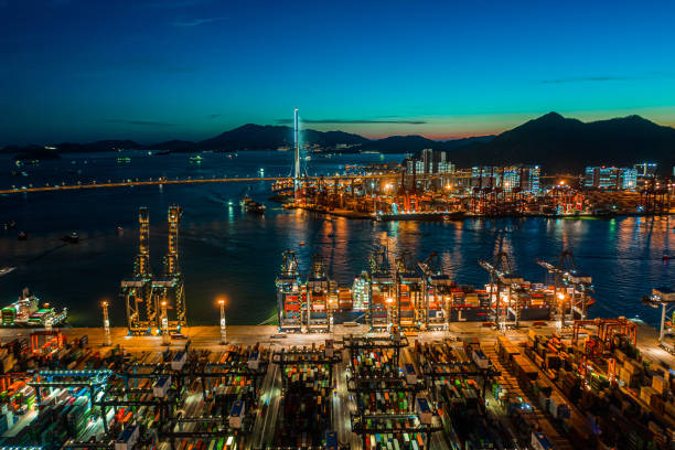 istock Containers stacking in the harbor at dusk 1263488983