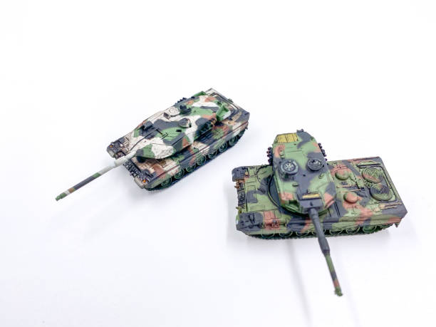 istock Toy tank isolated on white background 1263488999