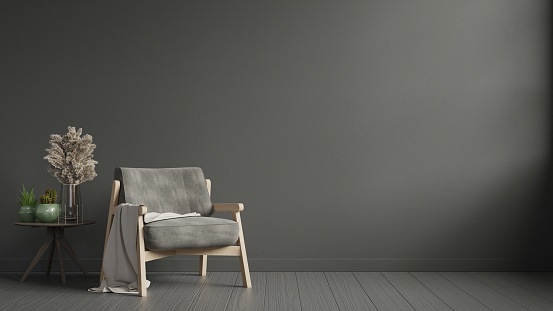 The interior has a armchair on empty dark wall background,3D rendering