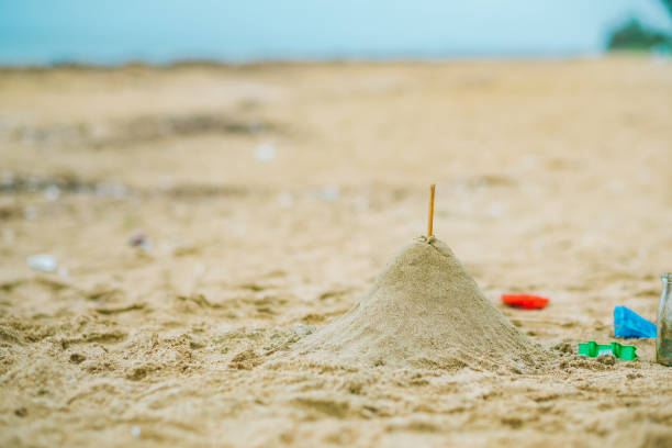istock Sand pile on the beach, Playing in the sand 1263496409