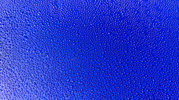 istock Abstract blue bokeh from water drop background. Lovely backdrop. Water drop on the window. 1263501948