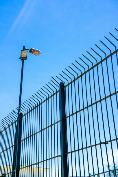 istock Wire fence with barbed wires 1263502674