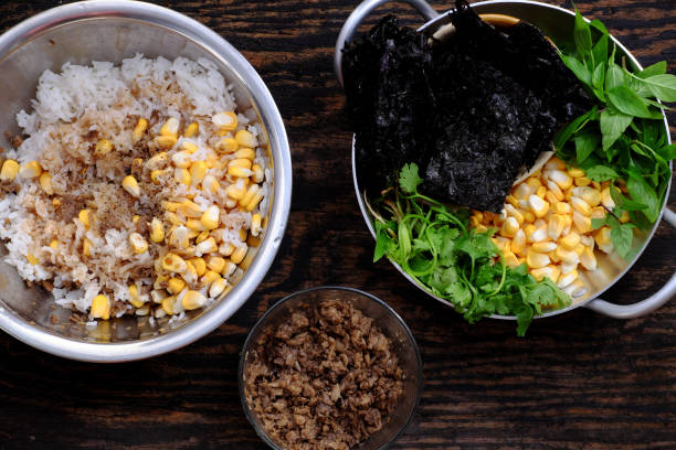 raw material ready to cook vegan vietnamese simple meal for lunch, cold rice, yellow corn, seaweed, basil - indochina soup flag national flag imagens e fotografias de stock