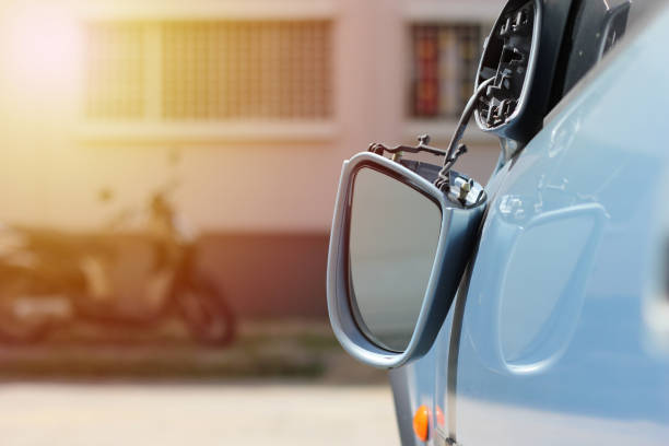 Close up car wing mirror, side view mirror broken from accident. Car insurance concept. Close up car wing mirror, side view mirror broken from accident. Car insurance concept. broken side view mirror stock pictures, royalty-free photos & images