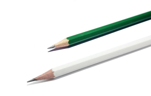 istock isolated white and green pencil on white background. 1263507669
