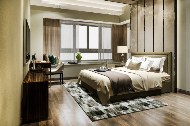 istock 3d rendering luxury bedroom suite in resort high rise hotel with working table 1263512541