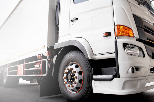 istock White container truck on parking. industry cargo freight logistics and transportation. 1263524685