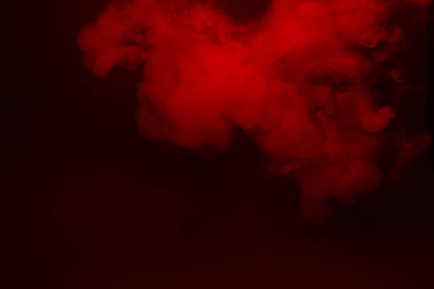 istock Colorful smoke close-up on a black background 1263529400