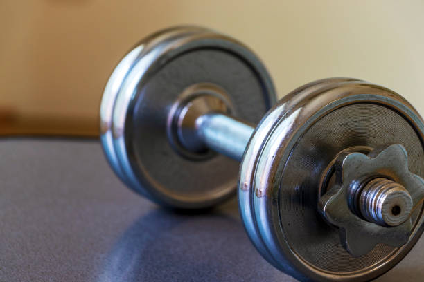 istock Metal dumbbell with glossy surface 1263531045