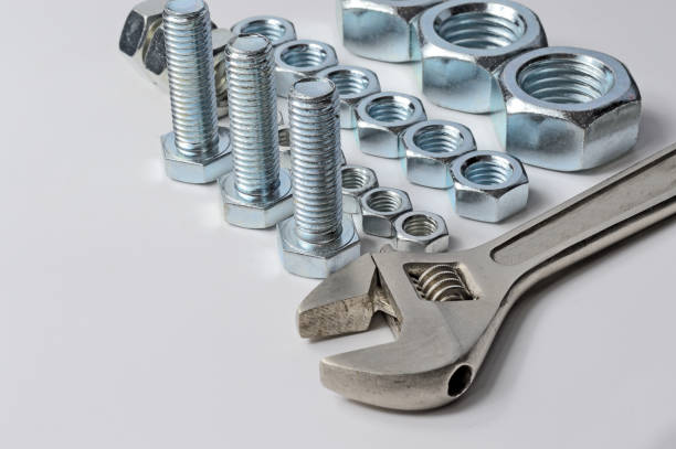 istock bolts and nuts neatly laid out on the surface. 1263533446