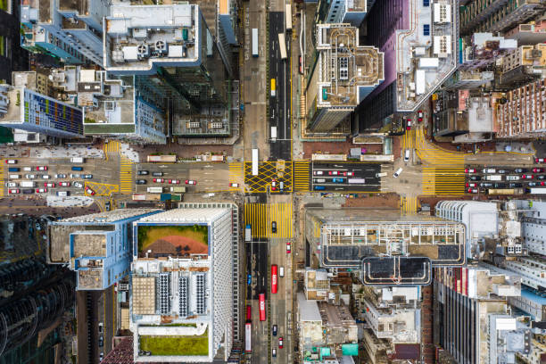 istock Streets in Mongkok district. Architecture and transportation background. Aerial view of skyscraper buildings in Hong Kong, Top view 1263537948