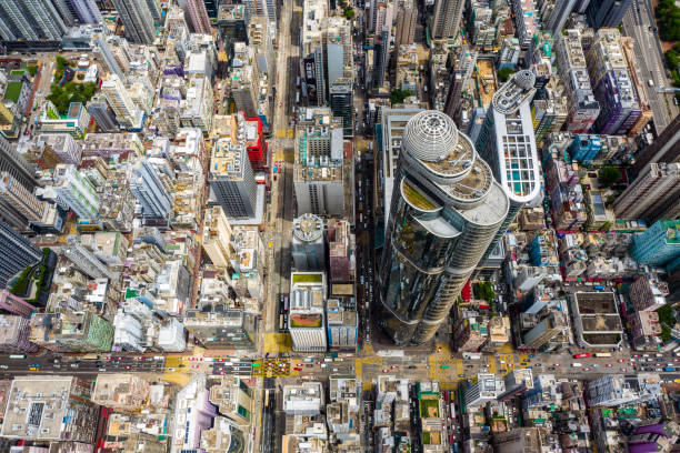istock Streets in Mongkok district. Architecture and transportation background. Aerial view of skyscraper buildings in Hong Kong, Top view 1263539020