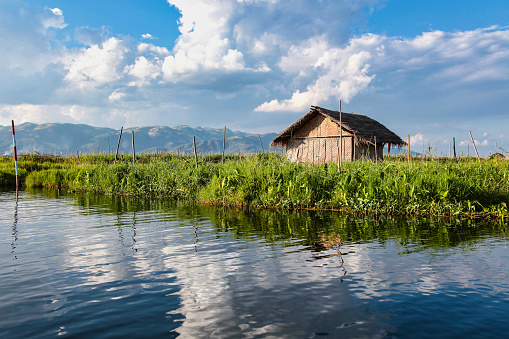 Wooden floating houses on Inle Lake in Shan, Myanmar, former Burma in Asia