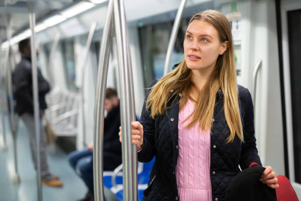 istock Young woman in subway car 1263540887