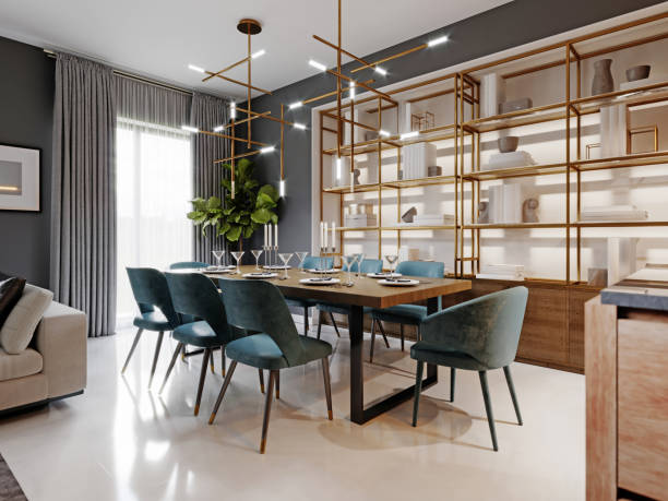istock Large modern dining table in a trendy style, dining area in a studio apartment. Wooden table top, fabric blue chairs. 1263542924