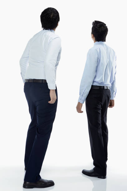 istock Two businessmen looking upwards 1263543180