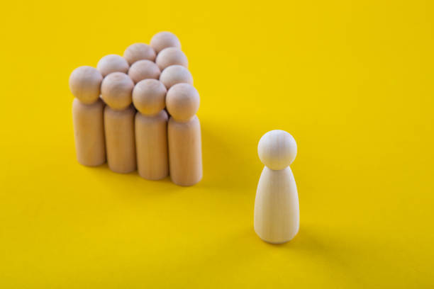 istock successful team leader, Leader standing out from the crown. 1263543491