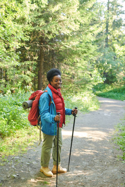 istock Woman walking in the forest 1263547531