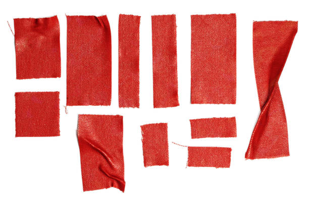 set of red fabric tape stripes on white background.