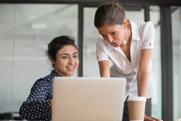 istock Millennial multiracial diverse employees working together at office 1263550273