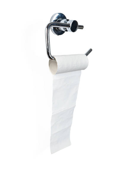 istock Unrolled toilet paper roll on holder isolated on white background 1263551592