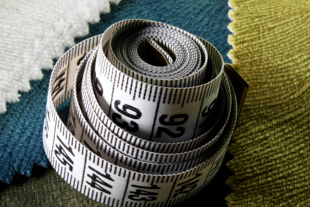 istock measuring tape on a fabric background 1263551844