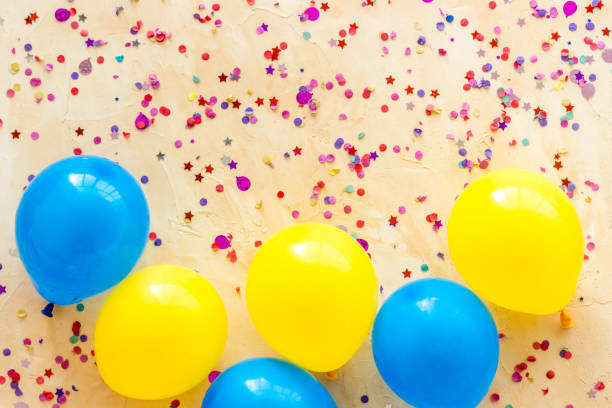 istock Flat lay with ballons - party concept - on beige background top-down copy space 1263553382